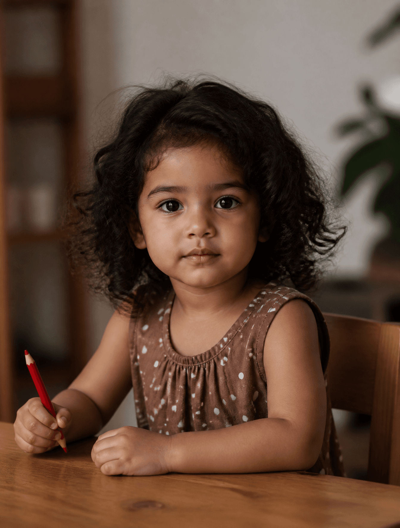 Subject and Action
A candid portrait of a toddler with volum