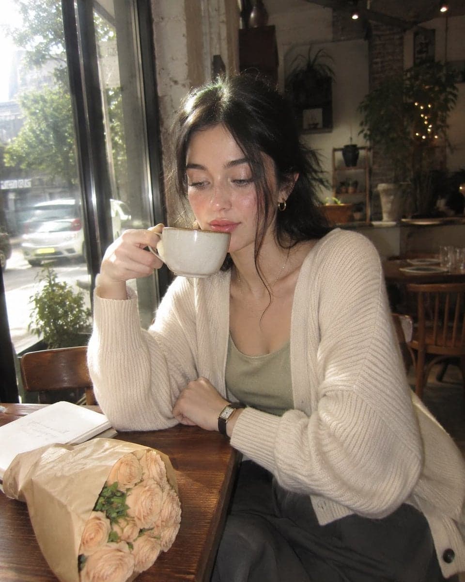 Create an ultra-realistic nostalgic café portrait captured o