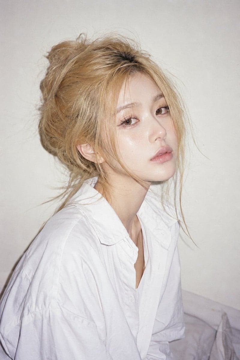 Photorealistic candid portrait of a beautiful woman against 