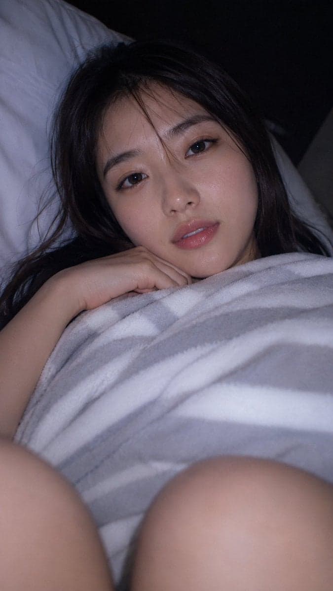 A photorealistic natural close-up bedroom selfie-style photo