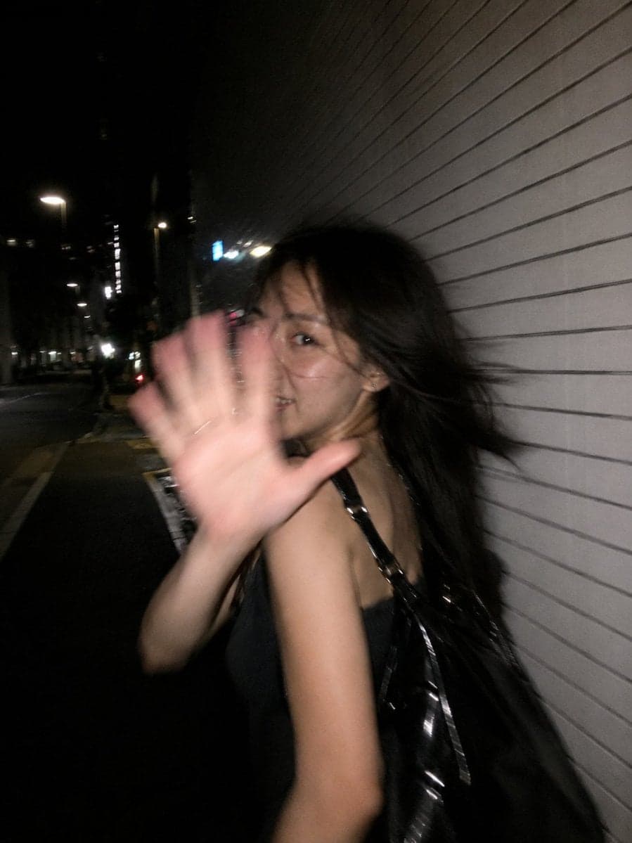 Ultra-realistic candid smartphone flash photograph, portrait