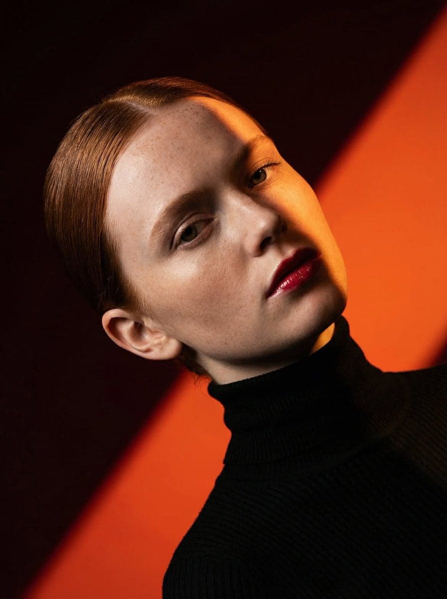 Ultra-high-fashion editorial beauty portrait of a fair-skinn