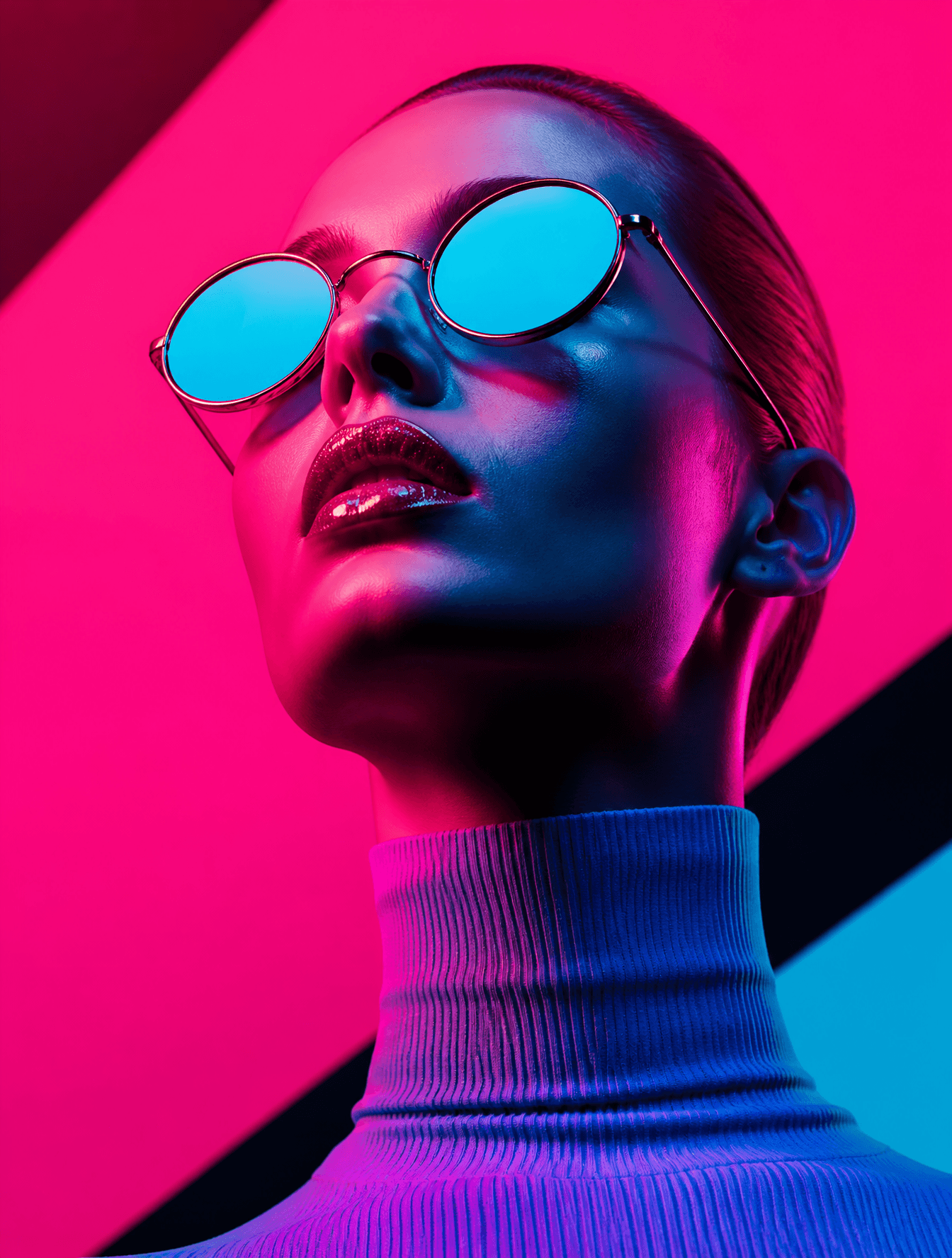 A high-fashion portrait features a woman with slicked-back h