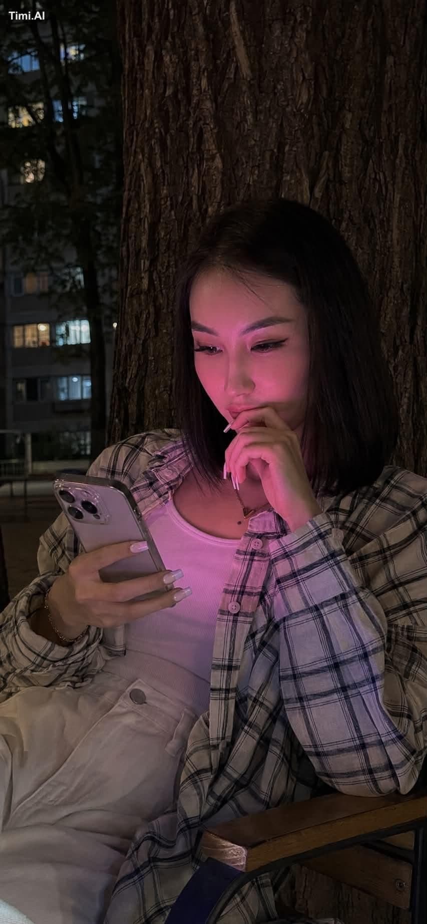 Realistic lifestyle photo shot on an iPhone 15 Pro at night.