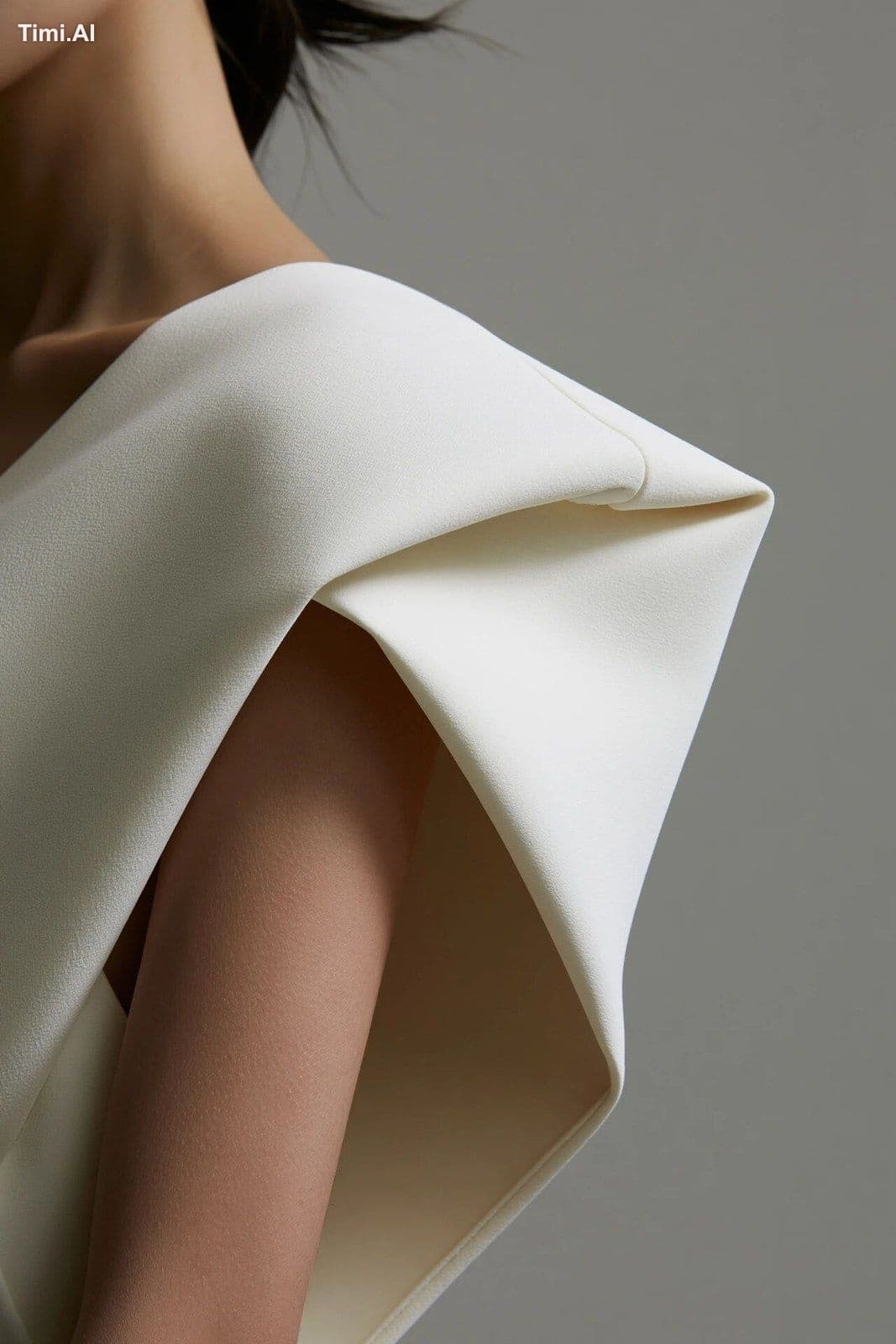 A close-up of a strong structural shoulder fold in a chalk-w