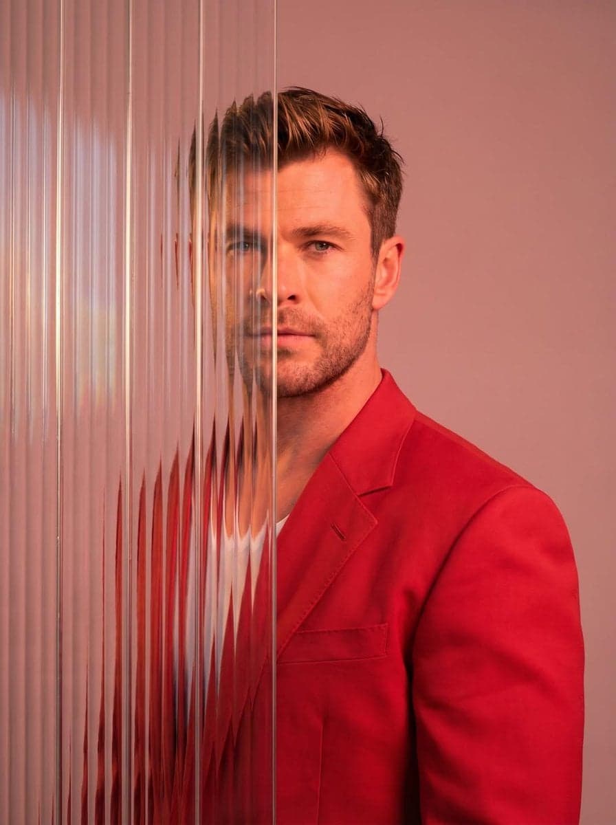 A striking editorial portrait photograph of a person wearing