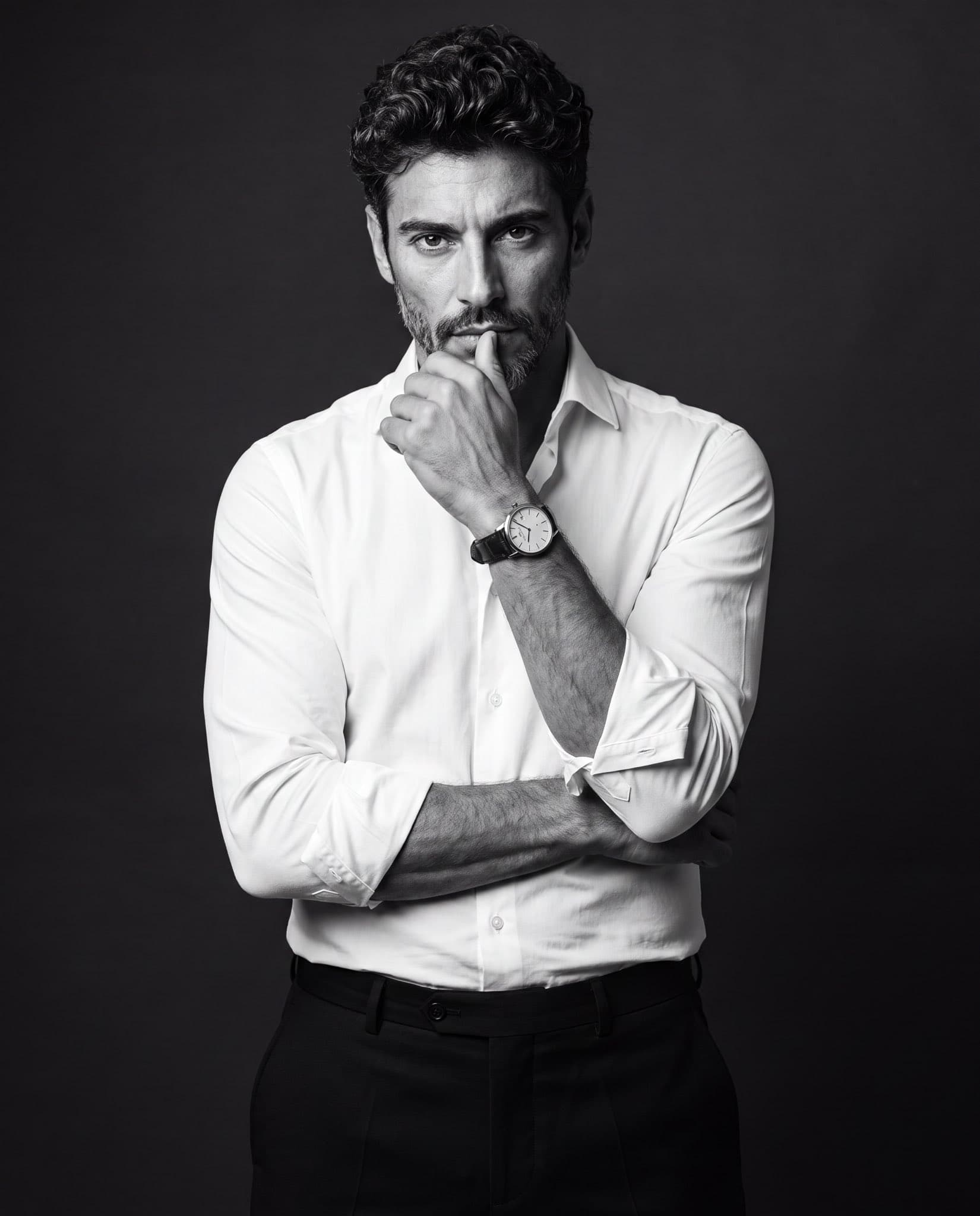 Create a premium black-and-white studio portrait of the uplo