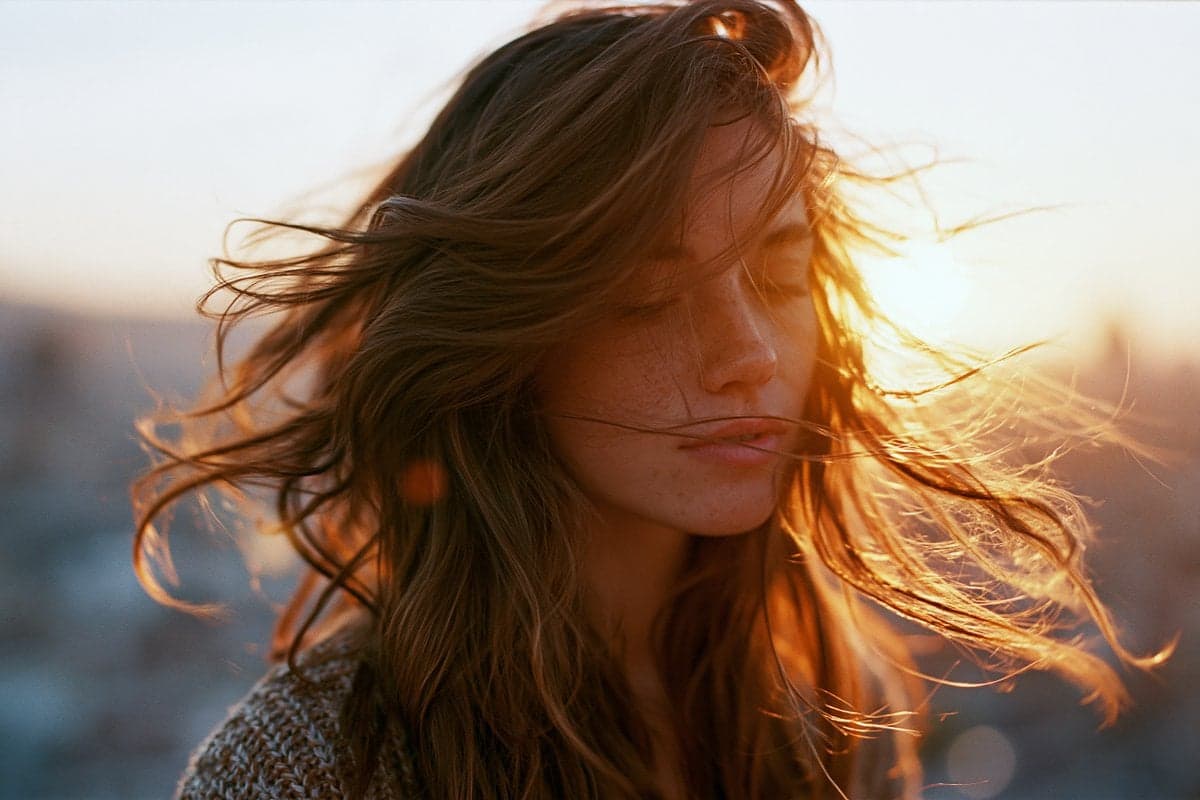 Photo of a woman's long hair blowing in the wind on a Barcel
