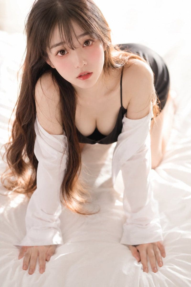 A soft, intimate 35mm photograph shot from slightly above, l